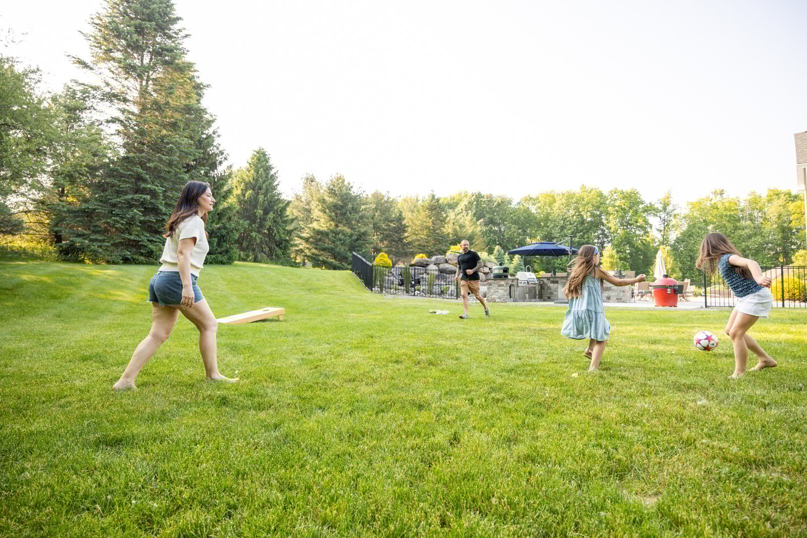 happy family client grass lawn games kids soccer playing