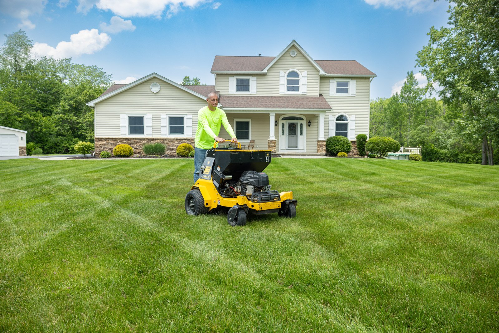 aerating lawn relieves soil compaction and helps prevent dandelions