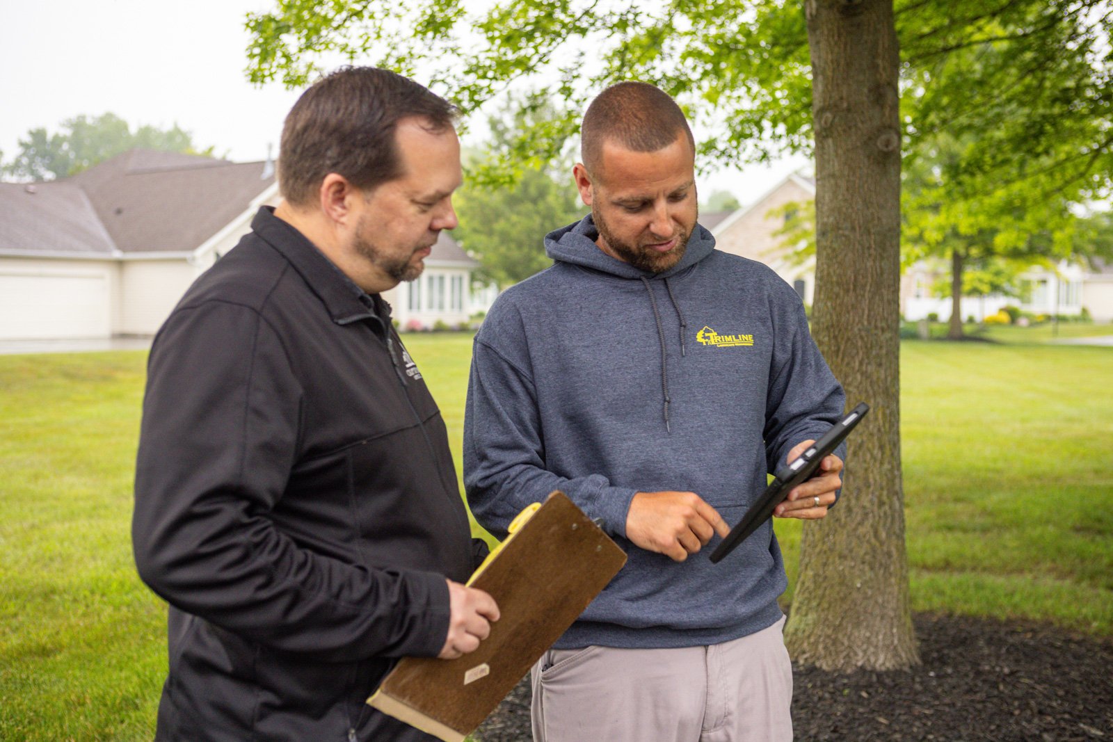 trimline account manager meeting with a client