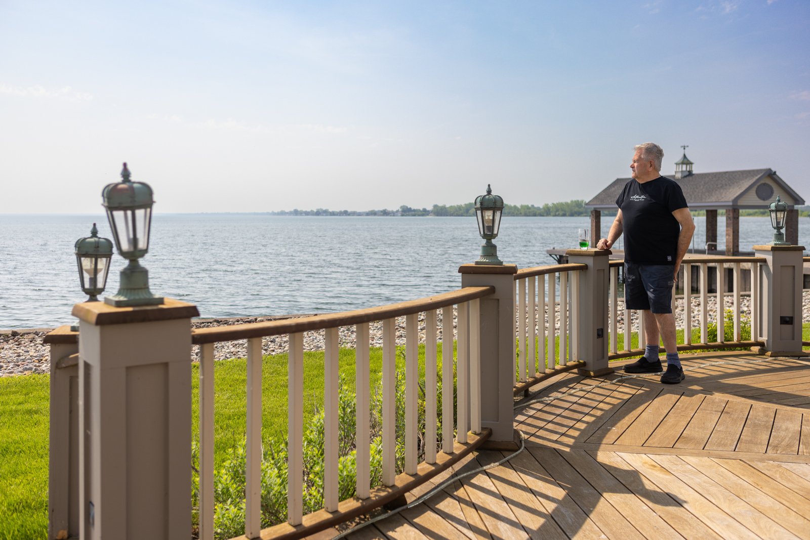 happy customer enjoying a healthy rochester lawn