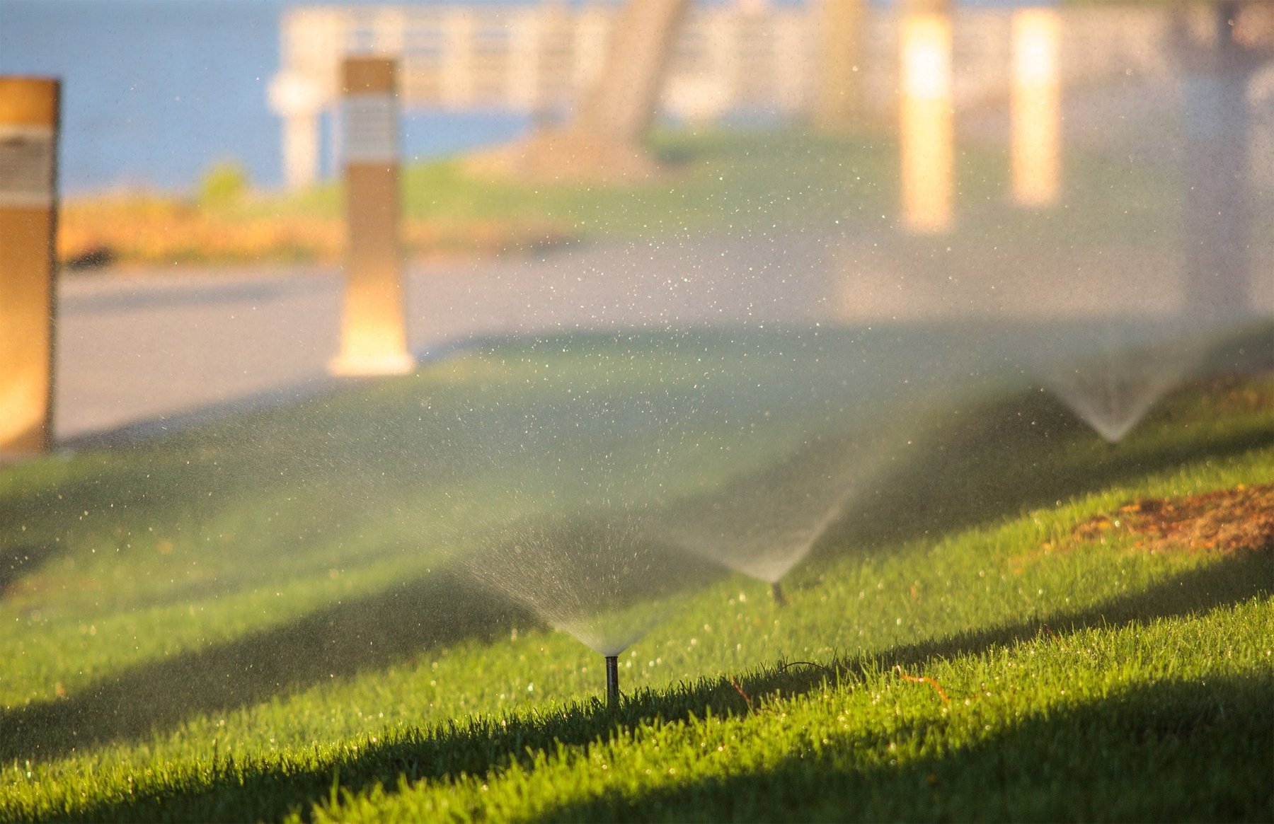 sprinkler systems help keep lawns watered in the summer